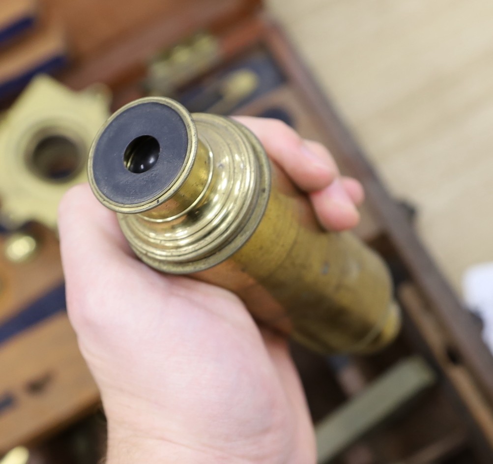 A 19th century cased brass monocular microscope